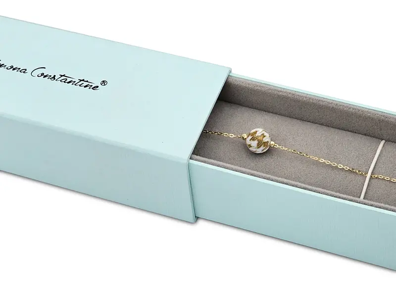 CHRISTIES BRACELET WHITE AND GOLDEN