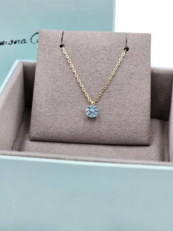 SOLITAIRE NECKLACE 6MM LIGHT BLUE W/G