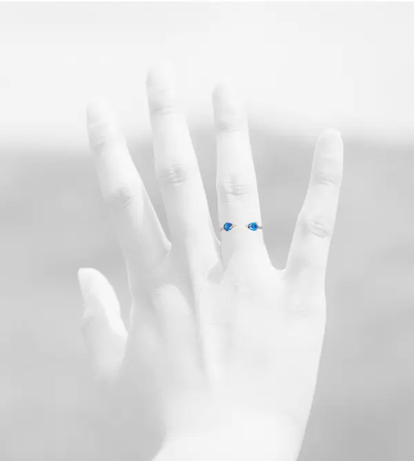 NATURA RING WITH 2 BLUE PEAR CUT CZ