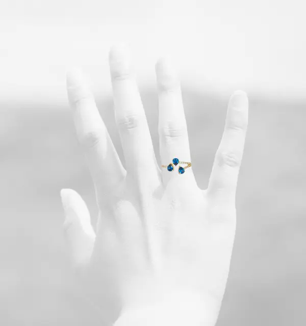 NATURA RING BYPASS WITH THREE PEAR SHAPED BLUE AND WHITE SMALL STONES