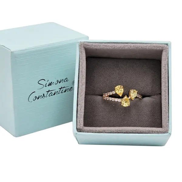 NATURA RING BYPASS WITH THREE PEAR SHAPED YELLOW AND WHITE SMALL STONES