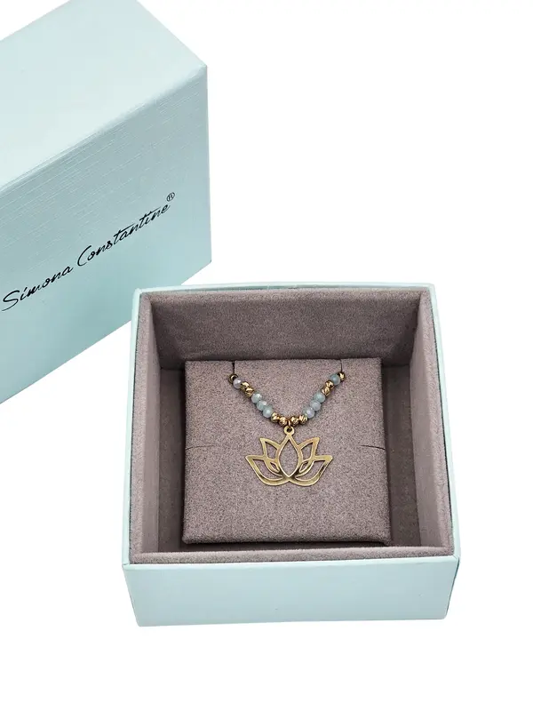 NATURA NECKLACE WITH 8 LITE BLUE CRYSTAL AND LOTUS PENDANT