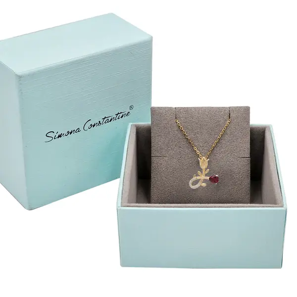 NATURA NECKLACE WITH GOLD FLOWER AND RED PEAR CUT CZ