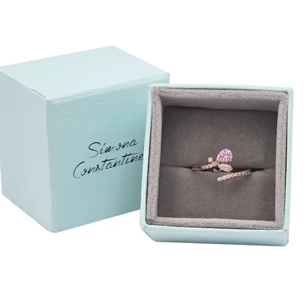 NATURA RING LEAFY BRANCH WITH ONE PEAR-SHAPED AND TINY PINK STONES