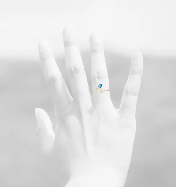 NATURA RING LEAFY BRANCH WITH ONE BLUE PEAR-SHAPED AND TINY WHITE STONES