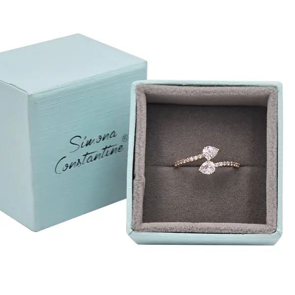 NATURA BYPASS RING WITH WHITE ZIRCONIA STONES