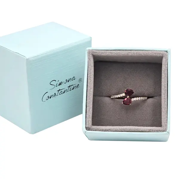 NATURA BYPASS RING WITH RED AND WHITE ZIRCONIA STONES