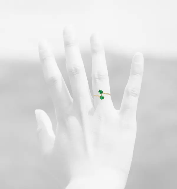 NATURA BYPASS RING WITH OVAL GREEN ZIRCONIA STONES