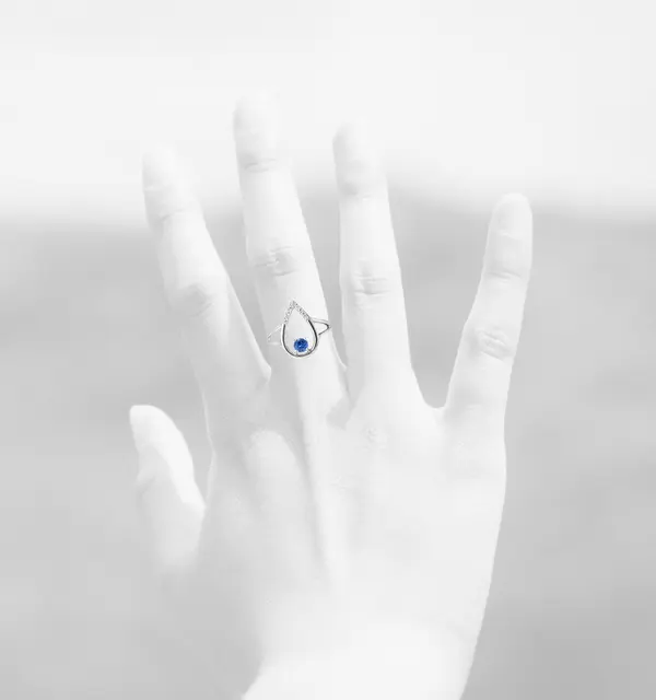 DIAMOND RING PEAR SHAPED WITH BLUE SAPHIRE