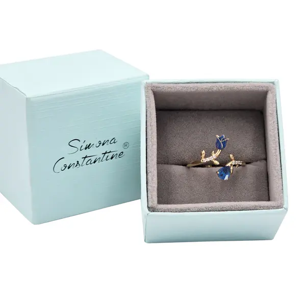 NATURA RING WITH BLUE FLOWER AND BLUE PEAR CUT CZ